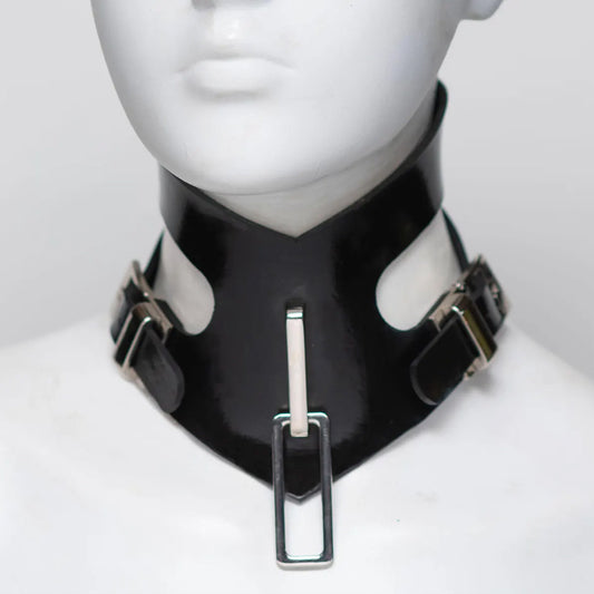 Black rubber collar with metal buckles on a mannequin head against a white background