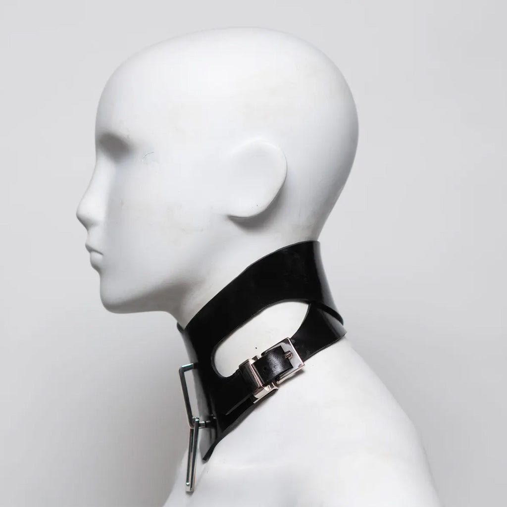 Black rubber choker with metal clasp on a mannequin head against a white background