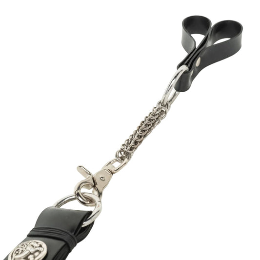 Black rubber flogger with silver chain and clasp on a white background