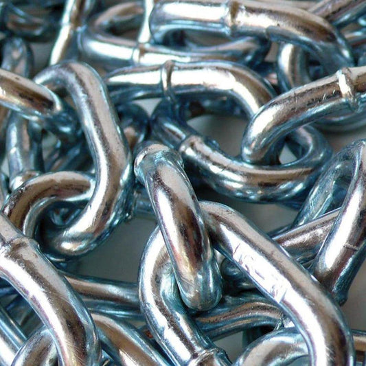 A close-up of a pile of Zinc-Plated Steel Chains is shown. The chains are silver.