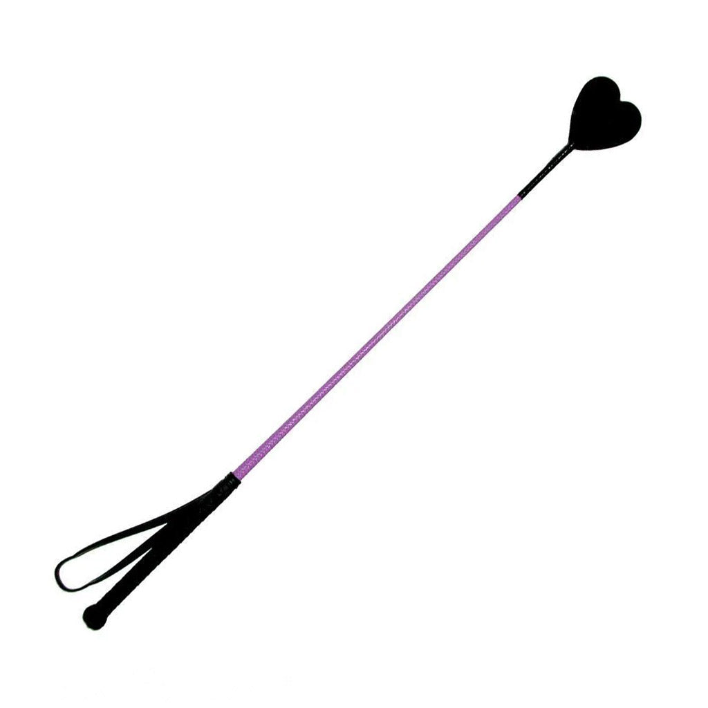 The Purple Heart Crop is displayed against a blank background. The crop has a black handle with a wrist loop and a black leather heart at the end, with a purple nylon rod in the middle.