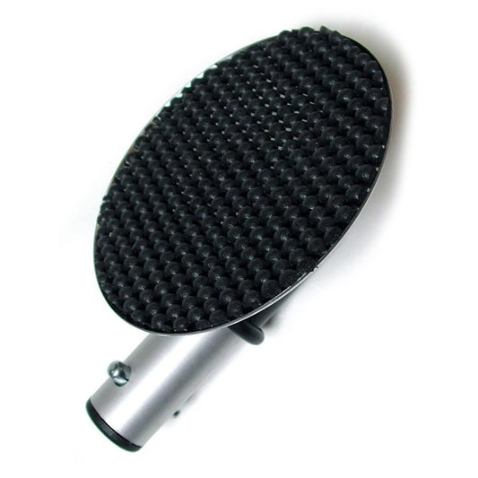 The Serving Tray Attachment For Scott Paul's Humiliator Gag, made of a round tray with a black rubber pad attached to a metal rod, is displayed against a blank background.
