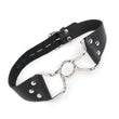 Load image into Gallery viewer, The Spider Gag is shown against a blank background. It is made of a silver metal O-ring in the center with protruding metal handles on each side. A black leather strap connects to the gag's handles.