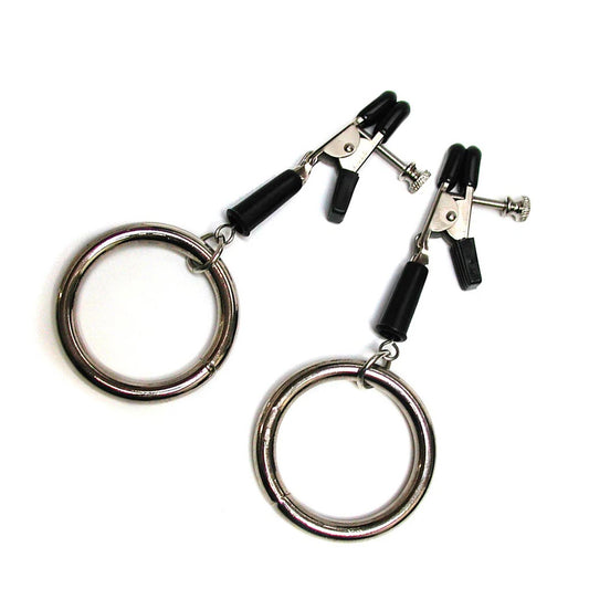 The Bully Nipple Clamps are displayed against a blank background. They are silver metal with black rubber tips, and each clamp has a large metal O-ring dangling from the bottom.
