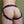 Load image into Gallery viewer, A close-up of a woman&#39;s butt in the purple leather La Strap On harness. There is a wide waistband and adjustable buckling straps that frame her butt.
