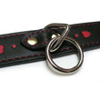 Load image into Gallery viewer, A close-up of the O-ring on the Black Leather Collar With Heart Inlay is shown against a blank background.