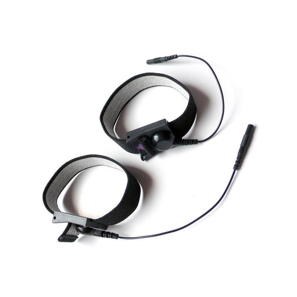 The penis and testicle belts from Mystim Charming Chuck are displayed against a blank background. They are loops of black electroconductive fiber with grey lining.
