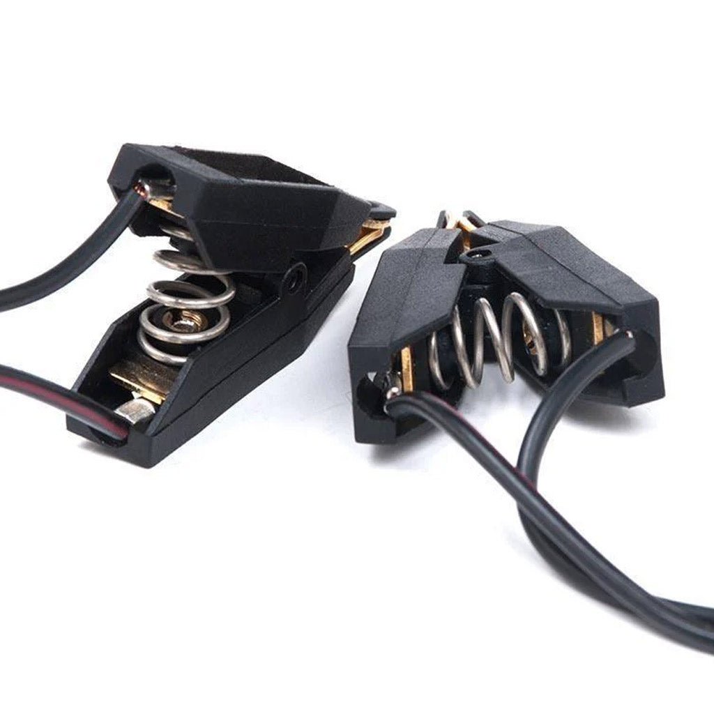 A pair of Mystim Barry Bite Bi-Polar Clamps are displayed against a blank background.
