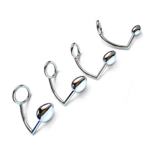 Four different-sized Trailer Hitch Kingpin anal plugs are displayed against a blank background from largest to smallest.