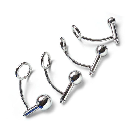 Four different-sized stainless steel Trailer Hitch Power Train plugs are displayed against a blank background from largest to smallest.