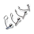 Load image into Gallery viewer, Four different-sized stainless steel Trailer Hitch Power Train plugs are displayed against a blank background from largest to smallest.