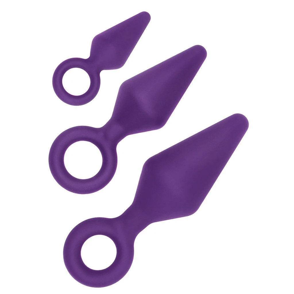 Three purple silicone butt plugs in graduated sizes from small to large.