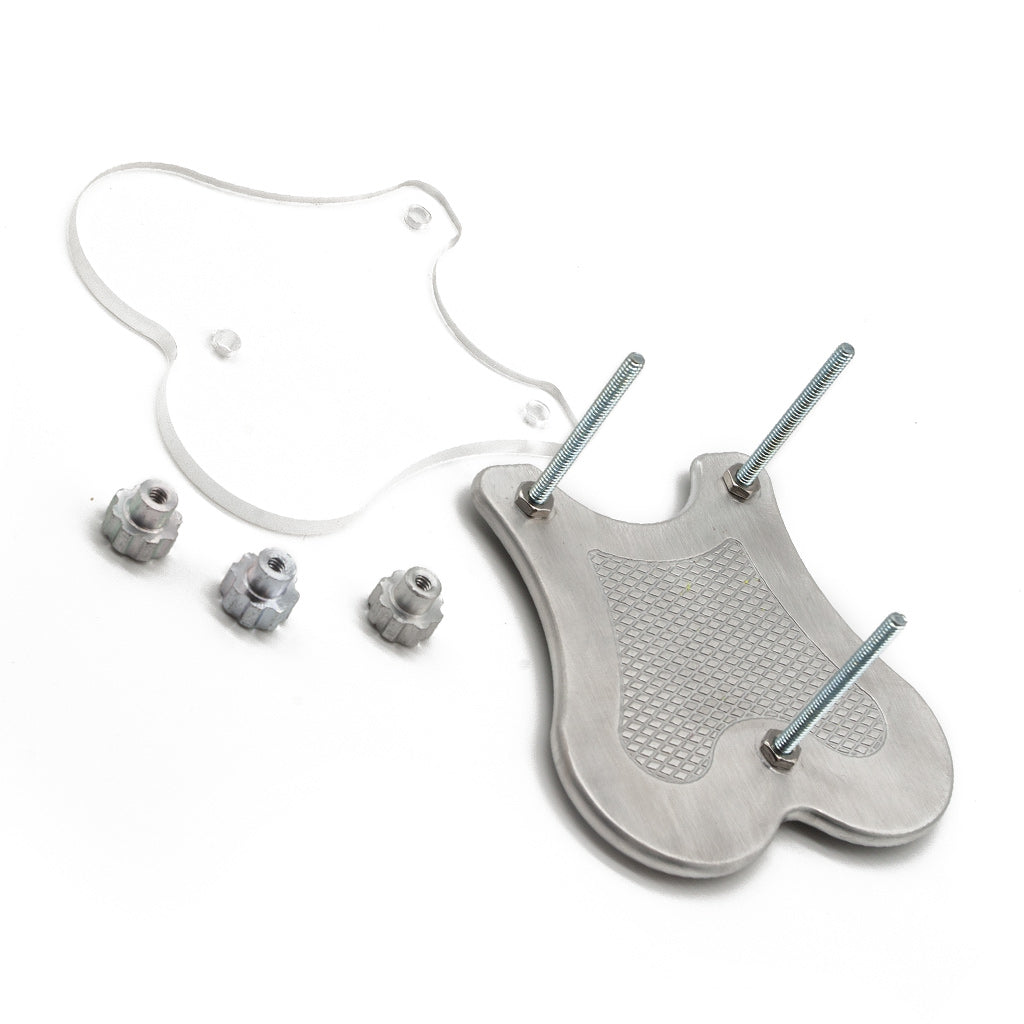 A disassembled Extreme CBT Ball Crusher is shown against a blank background. There is a metal bottom plate with three bolts is shown next to a clear acrylic top plate. The three nuts for the bolts are next to the plates.