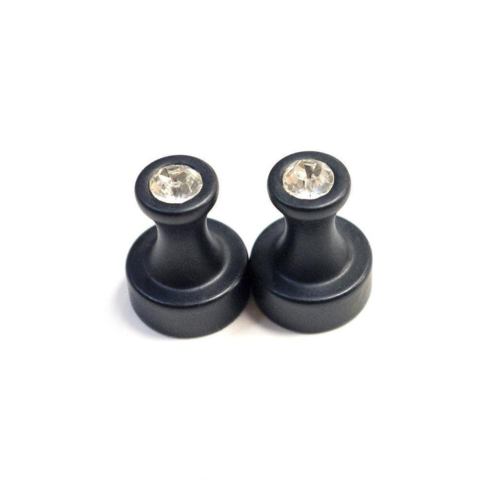 A pair of Magnetic Nipple Power Pinchers are displayed against a blank background.