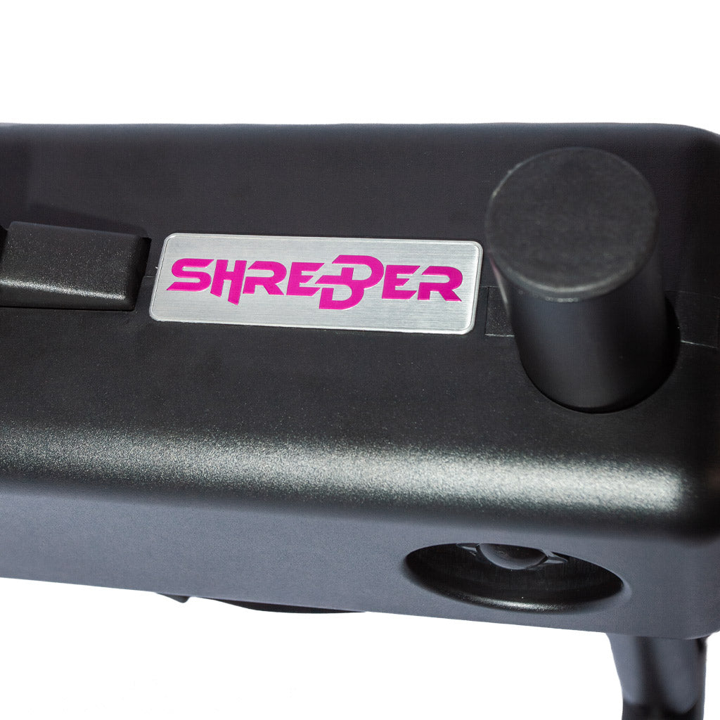 Closeup of the product, showing the SHREDDER logo on the black metal surface.