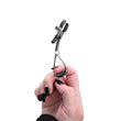 Load image into Gallery viewer, A product shot of the Velvet Noir Tuggable Nipple Clamps on a white background, with a woman's finger through the metal loop, as if pulling on it.