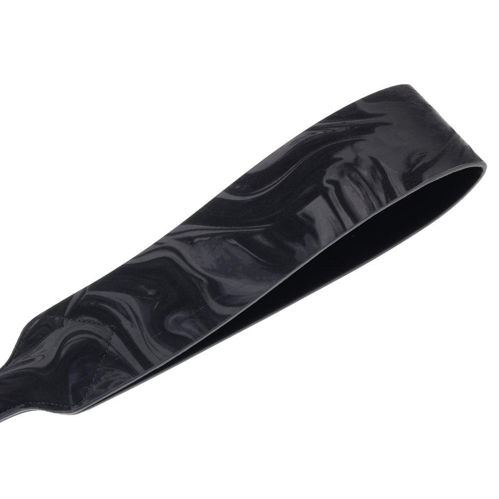 A close-up of the looped end of the Velvet Noir Loop Paddle.