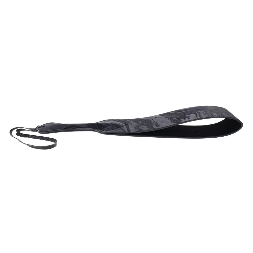 The Velvet Noir Loop Paddle seen from the side on a white background.
