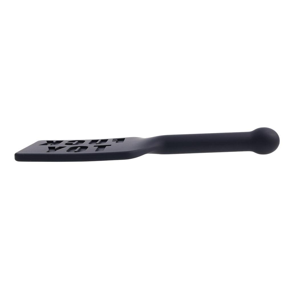 The Edge "Fuck Toy" Silicone Paddle seen from the side, in profile.