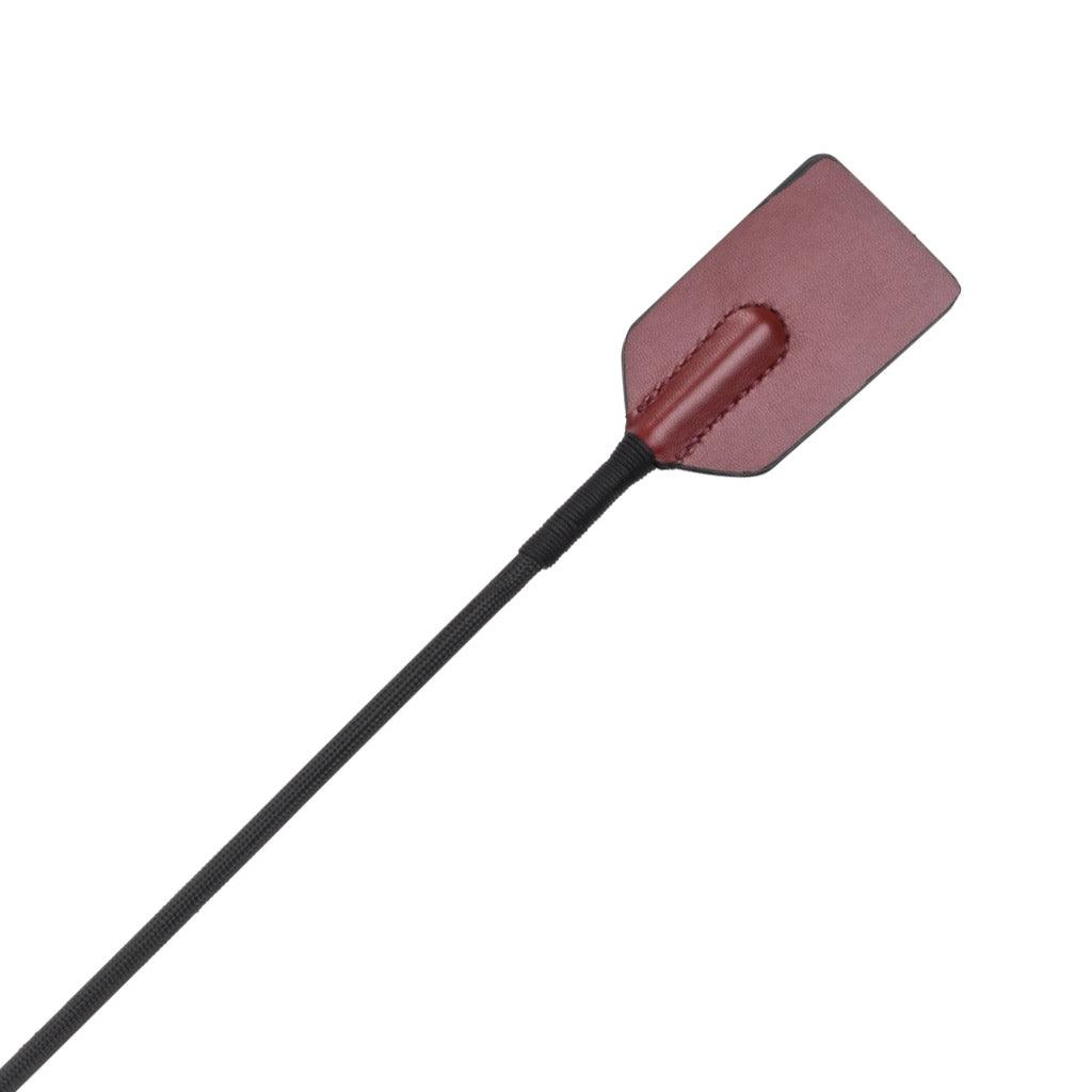 Closeup of the "crop" end of the Saffron Tap and Tickle. It's the "keeper" made of burgundy leather for sharp spanking.