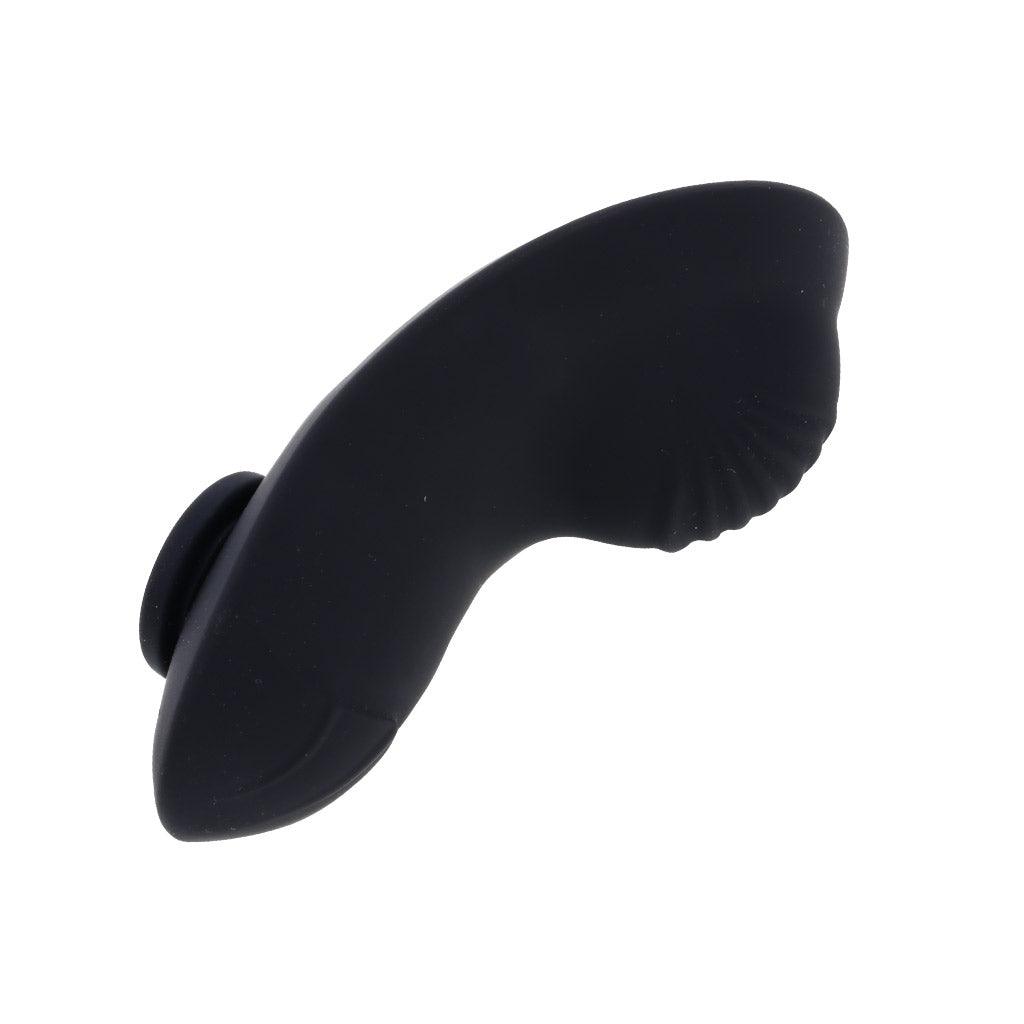 A close-up of the remote vibrator that comes with the harness.