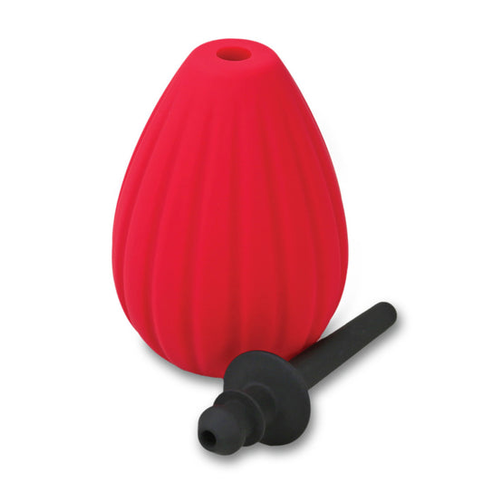 The Aneros Prelude Bulb dissassembled on a white background. The bright red bulb is standing on its base, with the nozzle lying at the bottom.