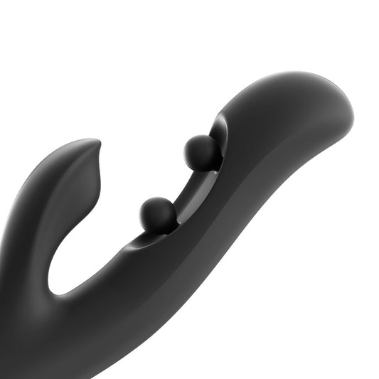 Close-up of the tip of the Honey Play Box vibe, focused on the two small spheres on the shaft.