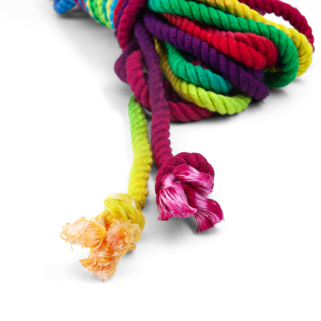 The knotted ends of the rainbow bamboo silk rope are shown against a white background.