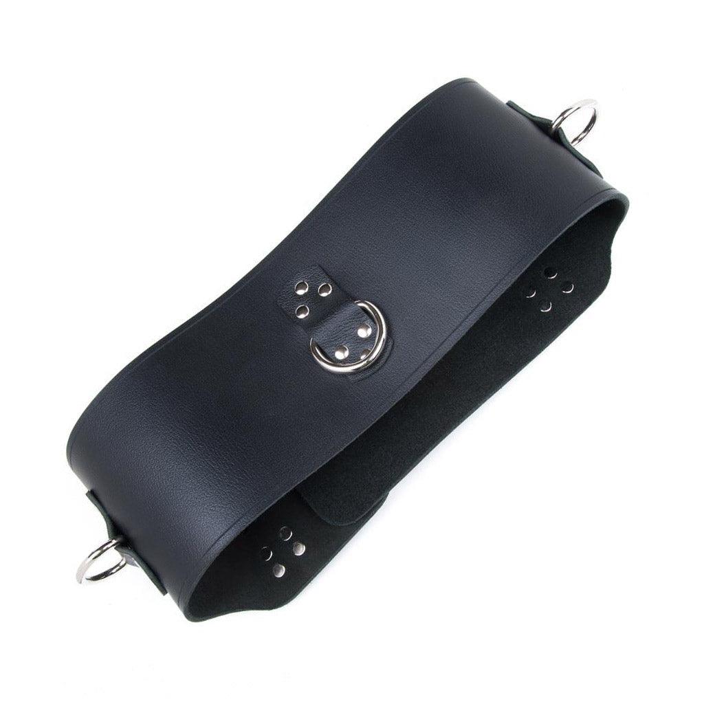 The back side of the black Heavy Leather Waist Cincher is shown against a blank background. The cincher has one D-ring in the center and one on each side.