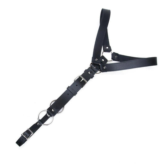 The Leather Y Body Harness with a Metal O-Ring is shown against a blank background. It is shaped like a Y, with shoulder straps connected to one long vertical strap that wraps around the body. The straps are adjustable and have buckles.