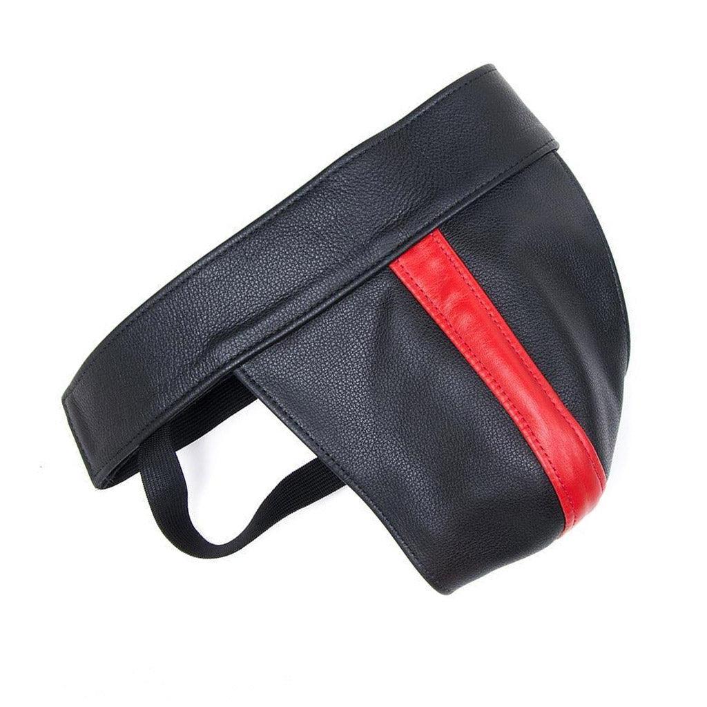 The red Leather Color Coded Jockstrap is shown against a blank background. It is a black leather jockstrap with black elastic strips. There is a vertical strip of red leather in the center of the jock.