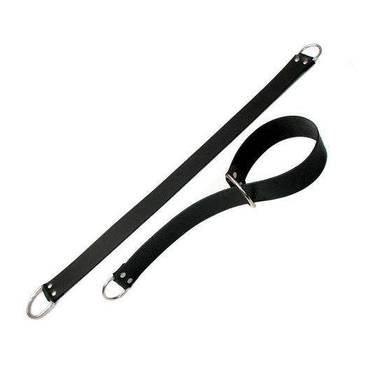 A pair of General Purpose Bondage Straps are shown against a blank background. They are wide strips of black leather with a metal D-ring on each end. One of the strips has been looped through one of the D-rings to create a cuff shape.