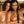 Load image into Gallery viewer, Two topless brunette women stand beside each other, leaning on each other. The woman on the right has her arms bound in front of her with the black leather Hobble Belt.
