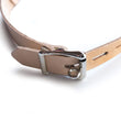 Load image into Gallery viewer, A close-up of the buckle closure of the Medical Silicone Ball Gag is shown against a blank background. The gag has an adjustable strap and a lockable silver buckle.