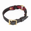Load image into Gallery viewer, The Melanie Rose Designs x The Stockroom Collar, made of red and black leather braided together with a gold O-ring in the center, is displayed against a blank background.
