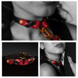 Load image into Gallery viewer, A collage shows one image of the Melanie Rose Designs x The Stockroom Collar against a black background, and two images showing half a woman’s face and neck, where she wears the collar. The images are in black and white except for the collar.