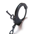 Load image into Gallery viewer, A close-up of one of the cuffs of the black Kinklab Double-Lock Police-Style Handcuffs is shown against a blank background.
