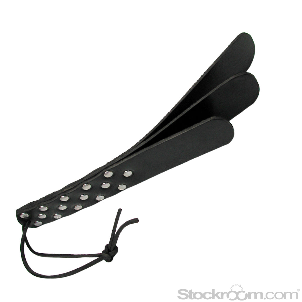 The Kinklab Triple Leather Slapper is displayed against a blank background. It is made of three pieces of black leather held together by metal rivets on the bottom half with a small wrist loop.