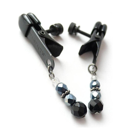 A pair of black Beaded Spring Jaw Nipple Clamps are displayed against a blank background.