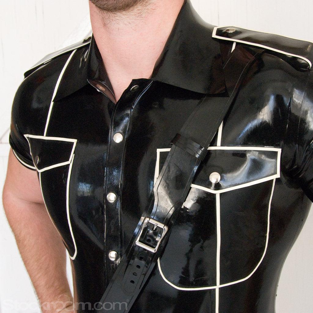 A close-up of a man's chest in the Uniform Shirt with Piping by Syren Latex shows the detailing on the shirt.