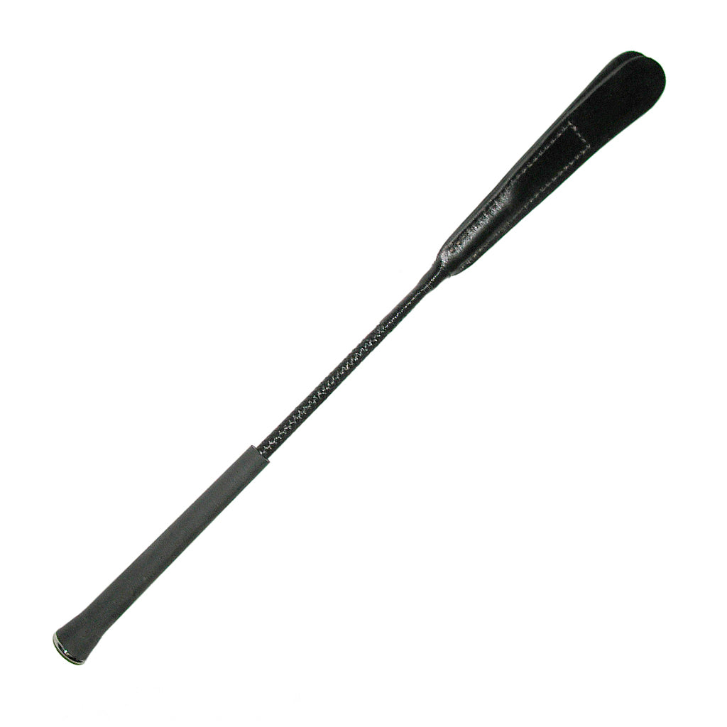 The Slapper Crop is displayed against a blank background. It is made of a black rubber handle, a short black nylon rod, and two long pieces of black leather attached at the top.