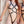 Load image into Gallery viewer, A closeup image of the torso of the woman with red hair is shown, displaying the Women&#39;s Buckle Up Leather Harness.
