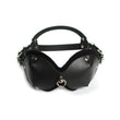 Load image into Gallery viewer, The Mistress Heather Leather Blindfold is displayed against a blank background. It is made of black leather with metal hardware. It has two adjustable straps with buckles on each side.