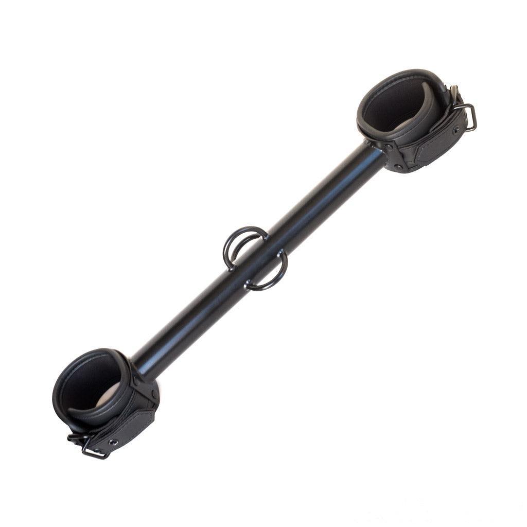 The black Big Barrel 12 Inch Wrist Spreader Bar With Cuffs is displayed against a blank background.