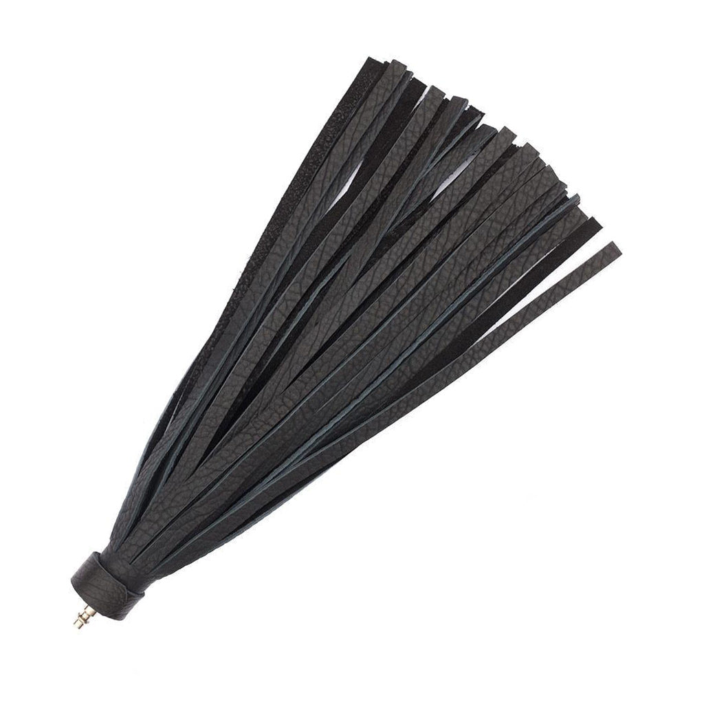 The Black Leather Bison Hide Interchangeable Flogger with ½ inch falls is displayed against a blank background. A small piece of metal is at the base of the falls, allowing the flogger to be connected to a handle.