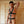 Load image into Gallery viewer, A nude man stands in front of wooden doors. He is wearing the Leather Torso Harness. A leather strap runs down the middle of his body to his cock, which is pulled through a metal O-ring. Other straps loop over his shoulders and around his torso, secured with metal buckles.
