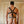 Load image into Gallery viewer, A nude man standing in front of wooden doors is shown from the back. He is wearing the Leather Torso Harness with straps looped over his shoulders, around his upper back, around his hips, and like a thong.
