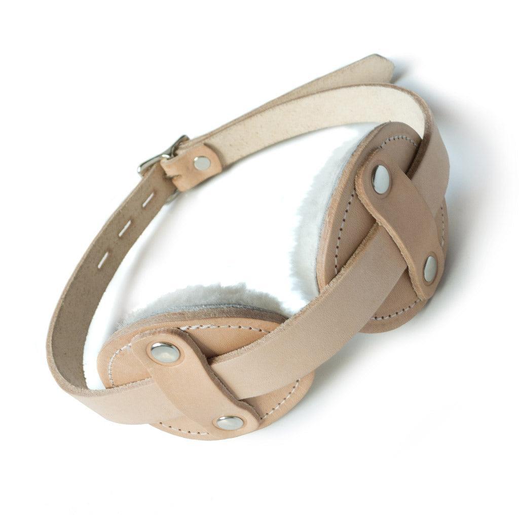 The Institutional Fleece Lined Blindfold is displayed against a blank background. The eye covers are lined with white fleece on the inside.