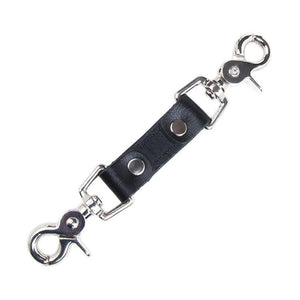 The black Premium Garment Leather Restraint Clip is displayed against a blank background. It is a short piece of black leather with silver metal rivets and a metal snap hook on each end.