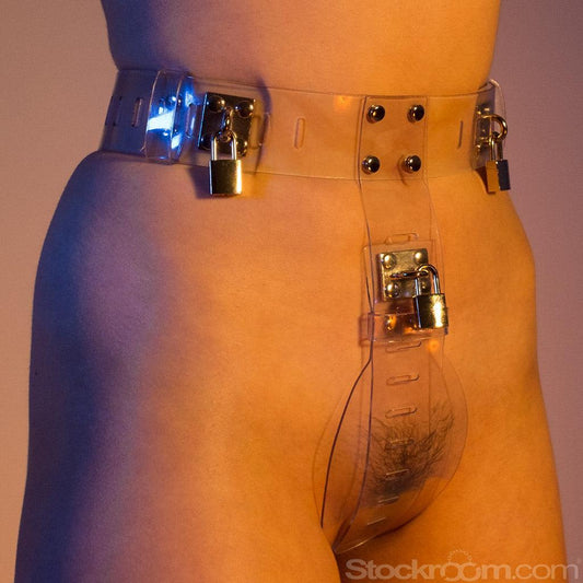 A woman's nude body in the pelvic area. Her genitals are covered by a chastity belt of transparent plastic.